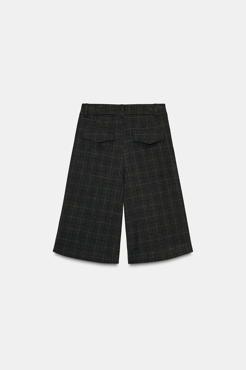 LONG PLAID PLEATED SHORTS
