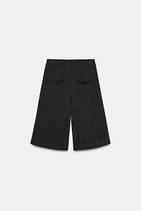 LONG PLAID PLEATED SHORTS