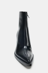 COWBOY HEELED ANKLE BOOTS