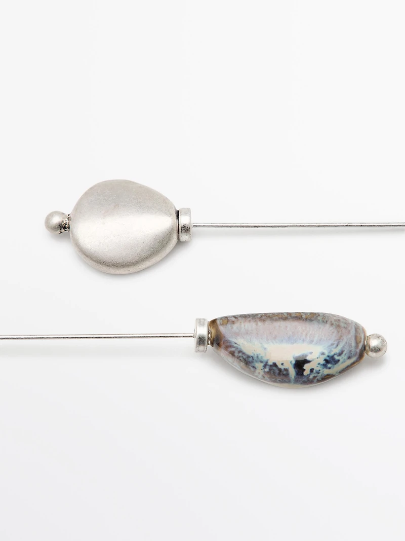 Brooch with ceramic leaf piece