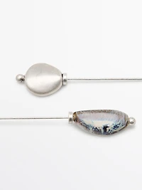 Brooch with ceramic leaf piece