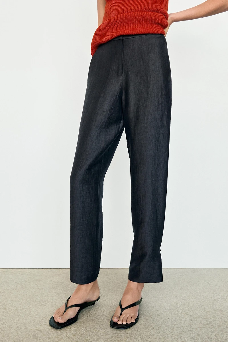 Trousers with gathered hems