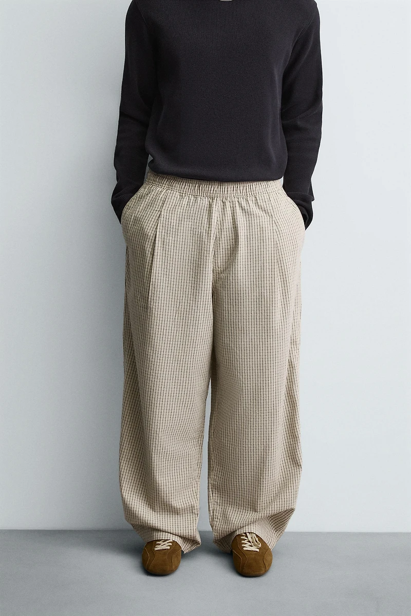 BALLOON FIT PLEATED PANTS