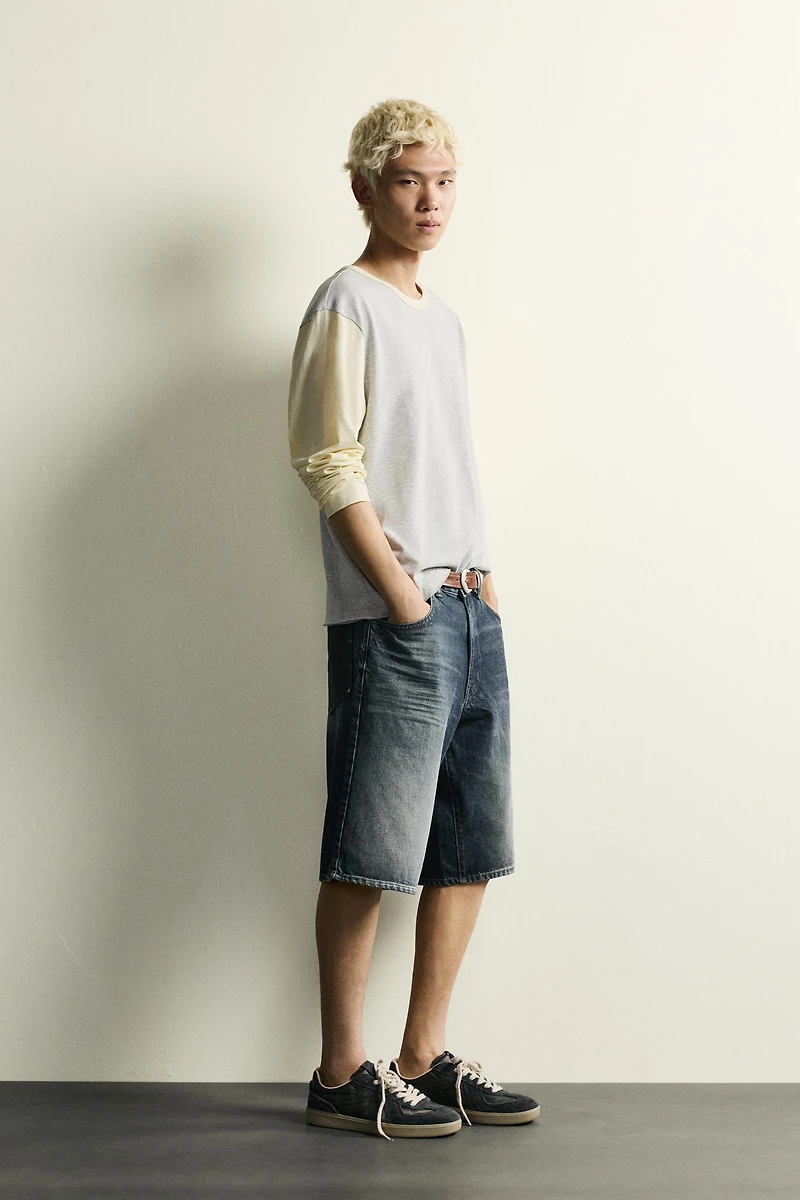 BAGGY FIT DENIM SHORTS WITH LEATHER POCKETS