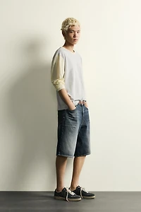 BAGGY FIT DENIM SHORTS WITH LEATHER POCKETS