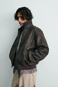 BLOUSON BOMBER EN MATIÈRE SYNTHÉTIQUE GRAVÉ FORD ©
