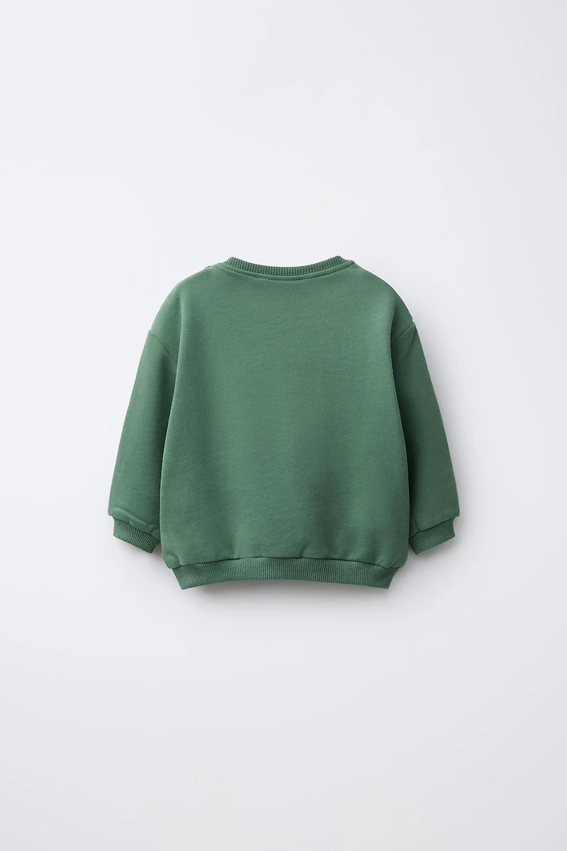 CLOVER PRINT AND EMBROIDERED TEXT SWEATSHIRT