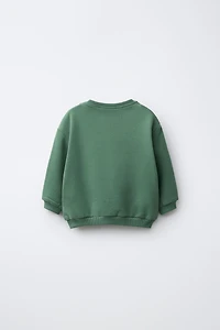CLOVER PRINT AND EMBROIDERED TEXT SWEATSHIRT
