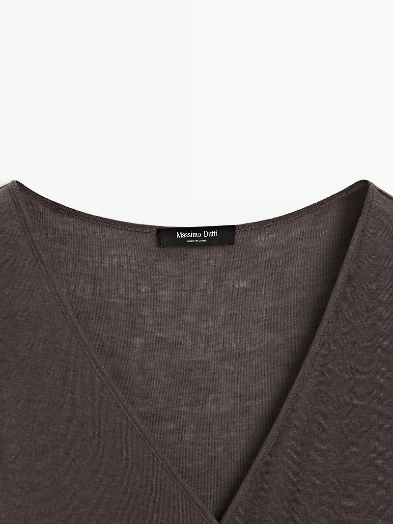 Lyocell and wool top with surplice neckline