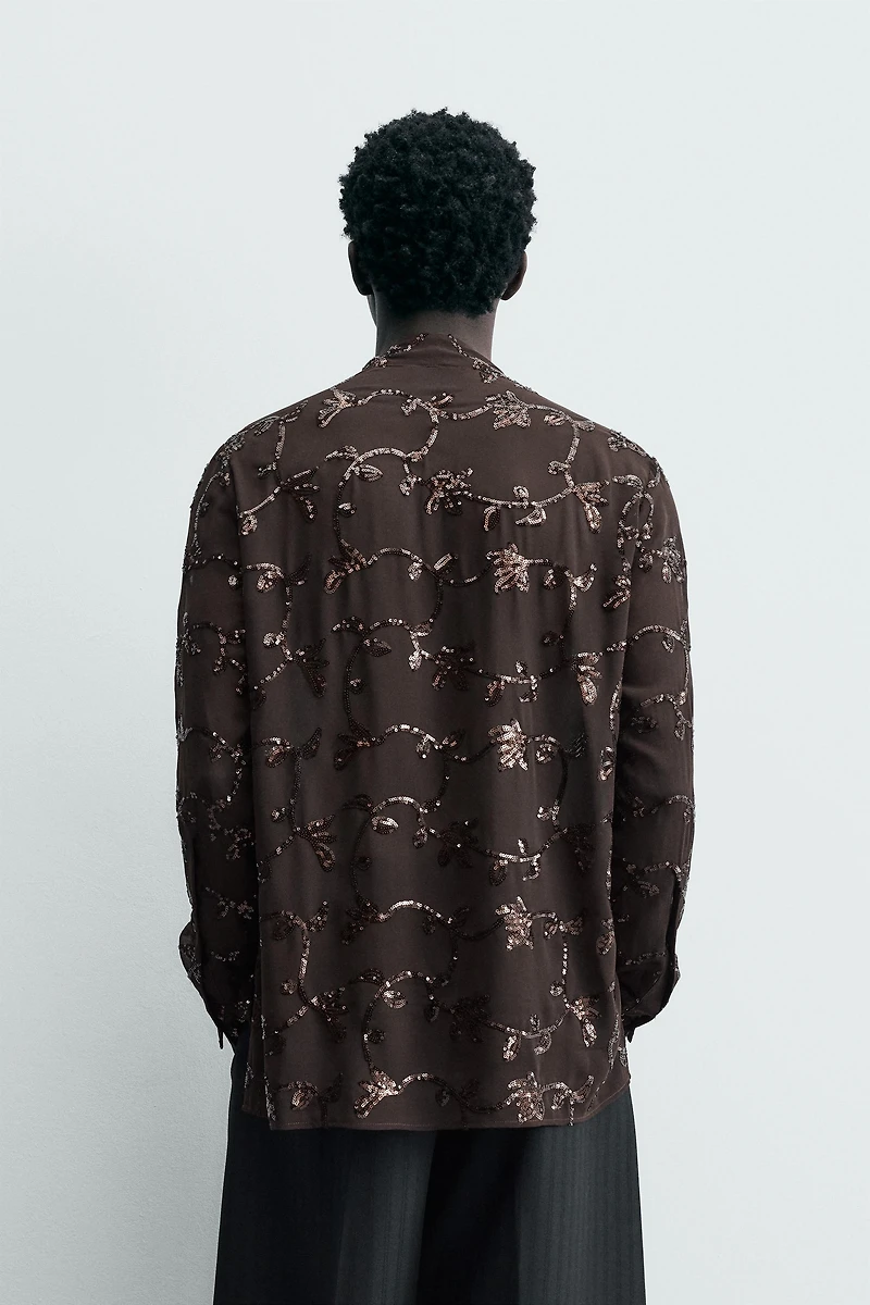 CHEMISE SEMI-TRANSPARENTE À PAILLETTES LIMITED EDITION