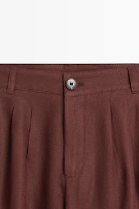 Wide-leg pleated linen trousers