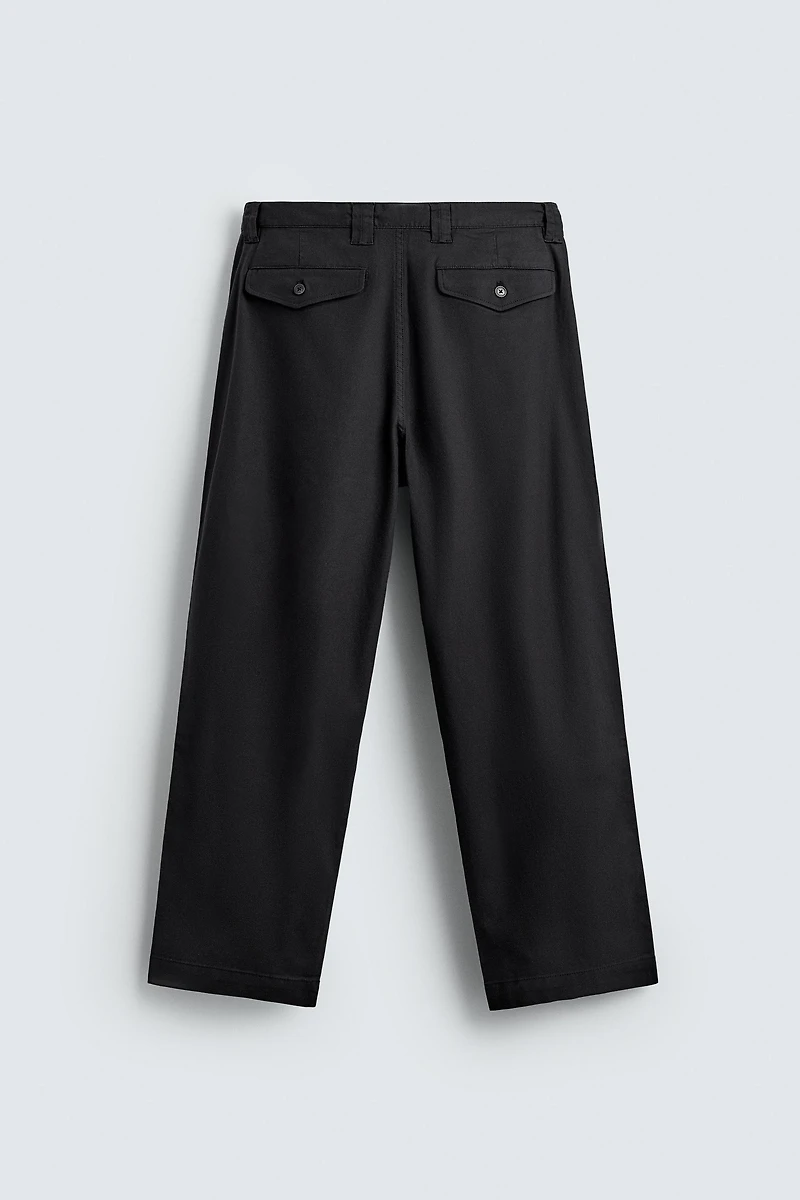 RELAXED FIT PLEATED PANTS