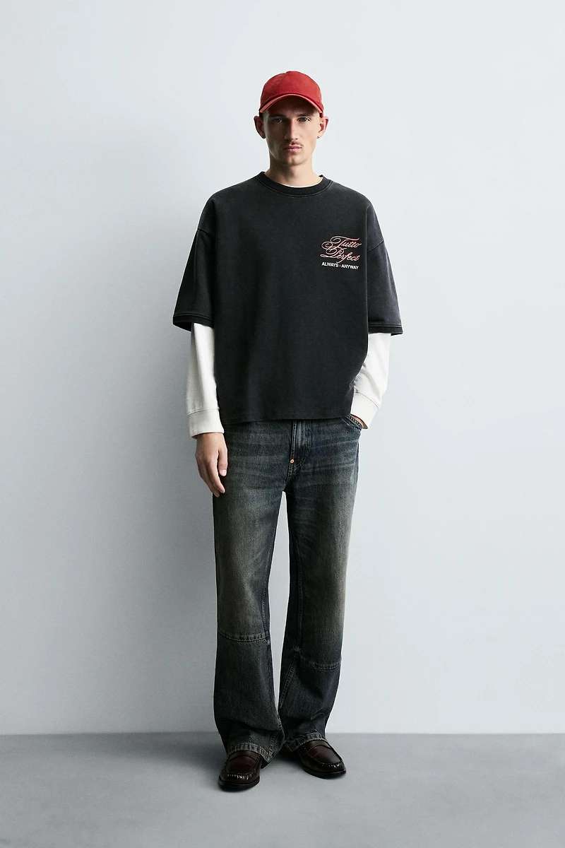 SWEAT DÉLAVÉ À INSCRIPTIONS IMPRIMÉES