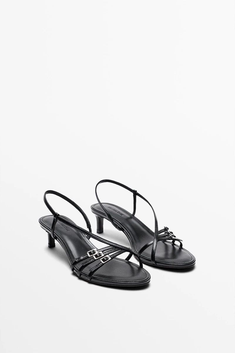 Leather heeled sandals with buckles
