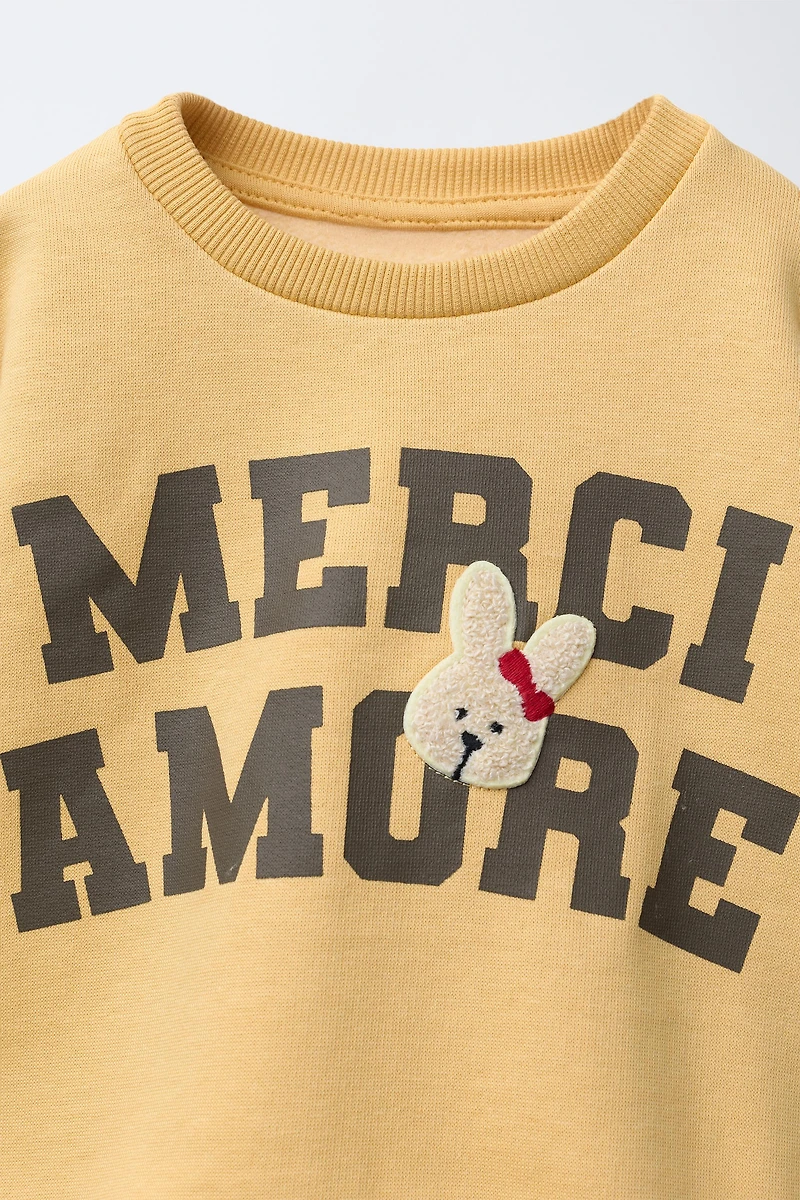 VARSITY TERRY PATCH APPLIQUÉ SWEATSHIRT