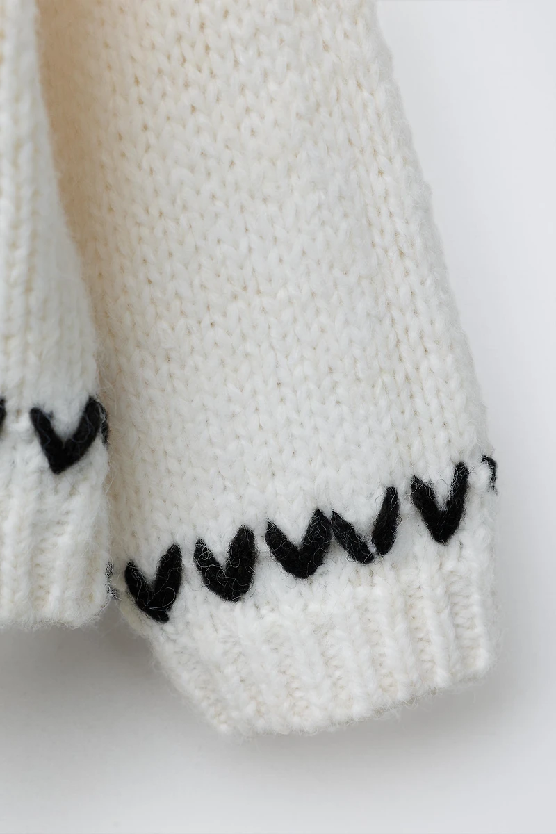 KNIT JUMPER WITH PIPING