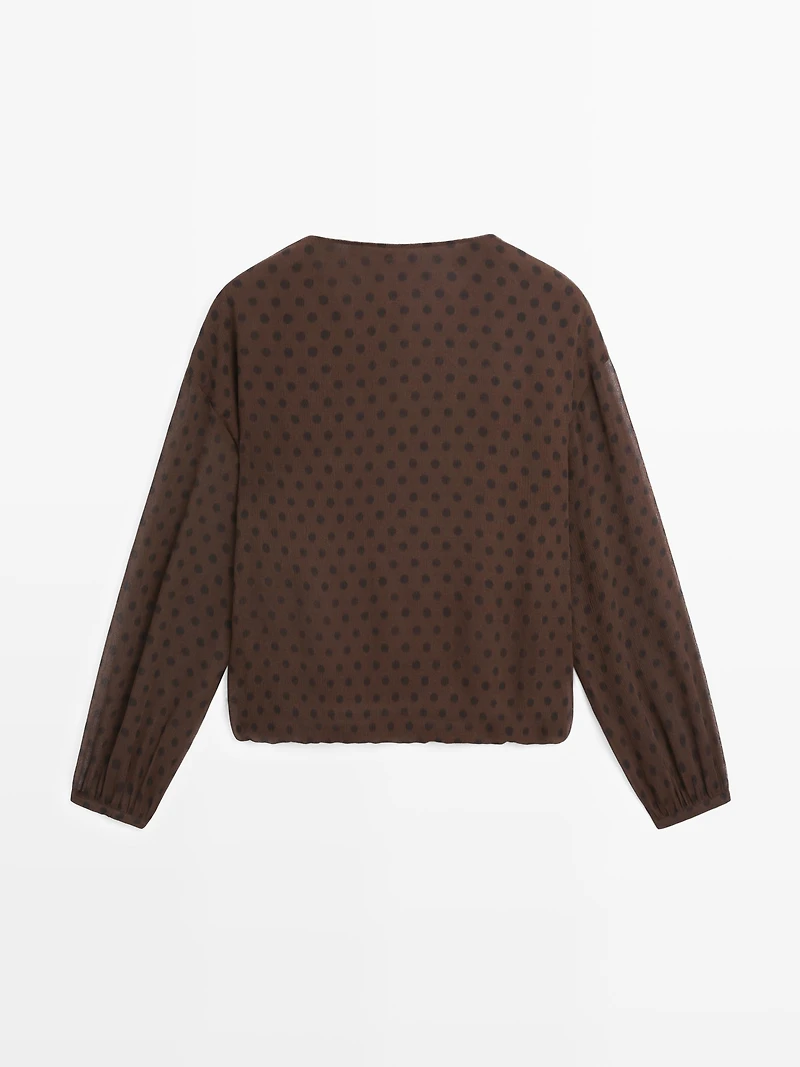Flowing surplice polka dot blouse