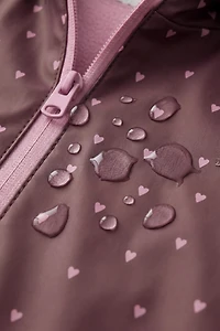 WATER-RESISTANT HEART PRINT RUBBERIZED RAINCOAT