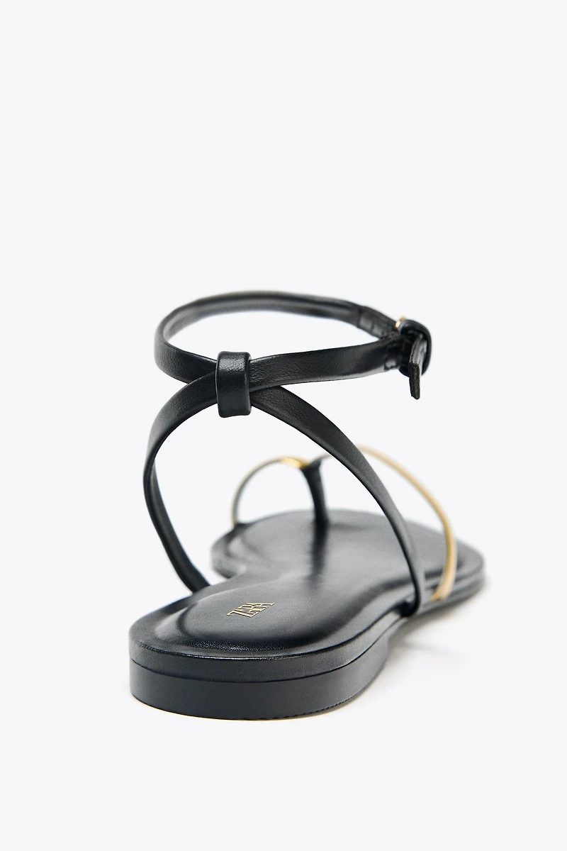 FLAT SANDALS WITH DETAIL