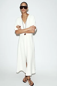 ROBE MI-LONGUE À MANCHES BOUFFANTES