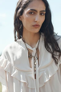 TIED RUFFLED BLOUSE LIMITED EDITION