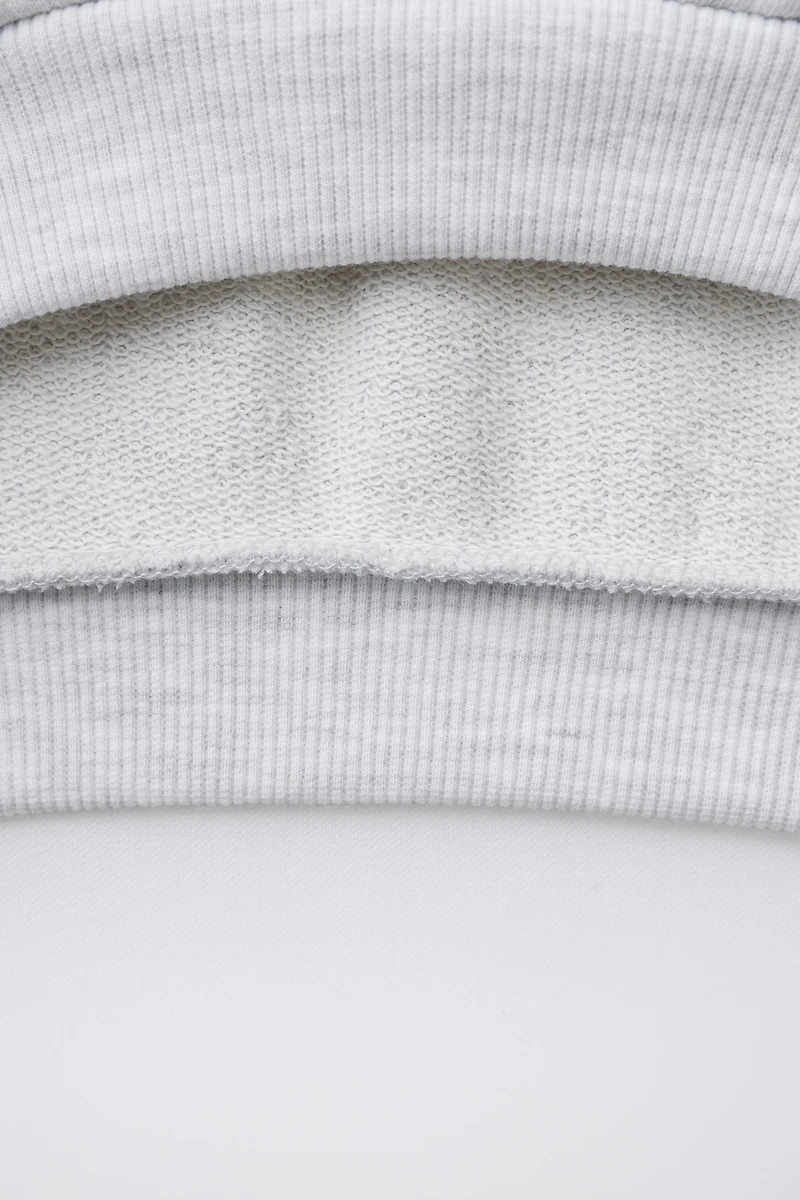 EMBROIDERED LABEL POLO SWEATSHIRT