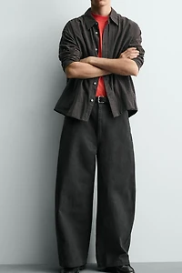 RELAXED FIT PANTS WITH TWISTED SEAM