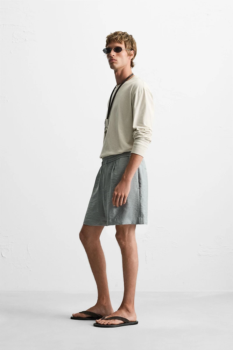 FLOWY RELAXED FIT BERMUDA SHORTS