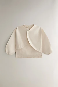 CHILDREN'S SKATING DOG BIB WITH SLEEVES