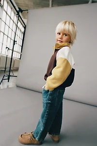 DISTRESSED BALLOON JEANS