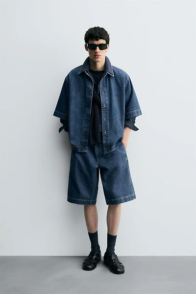PLEATED RELAXED FIT DENIM SHORTS