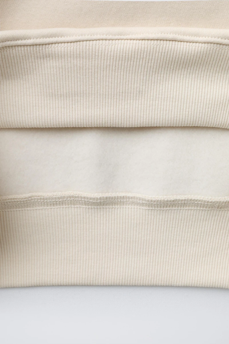 SWEAT À INSCRIPTION FLOQUÉE