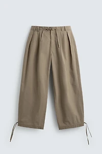 PANTALON COUPE BALLON À PLIS