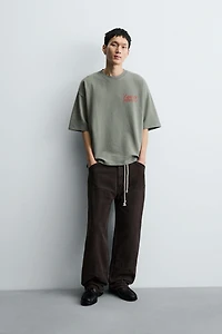 WASHED PRINTED TEXT SWEATSHIRT