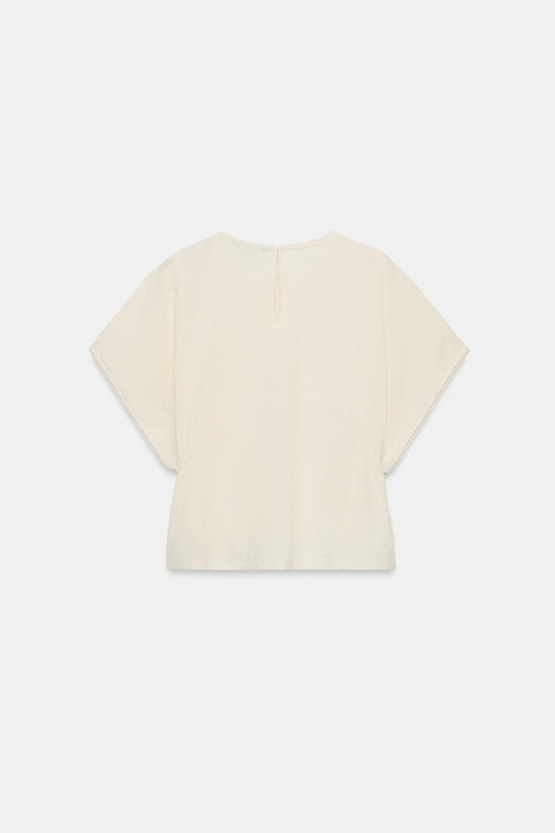 EMBROIDERED TOP WITH SIDE LACING