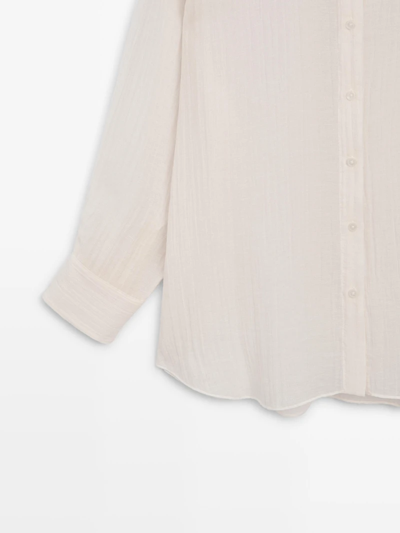 Flowing shirt with pleated detail