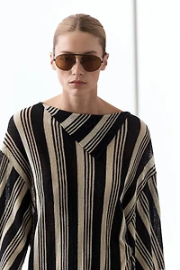 Pull en maille style tunique rayé