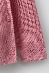 PULL EN MAILLE À PAPILLONS