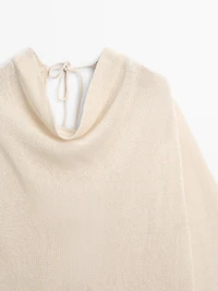 100% cotton knit sweater with back ties