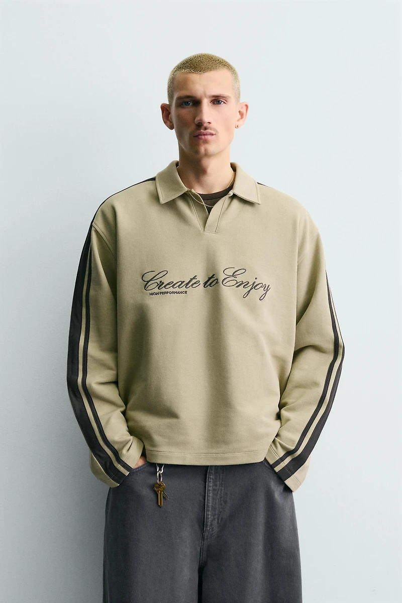 BOXY FIT EMBROIDERED STRIPED SWEATSHIRT