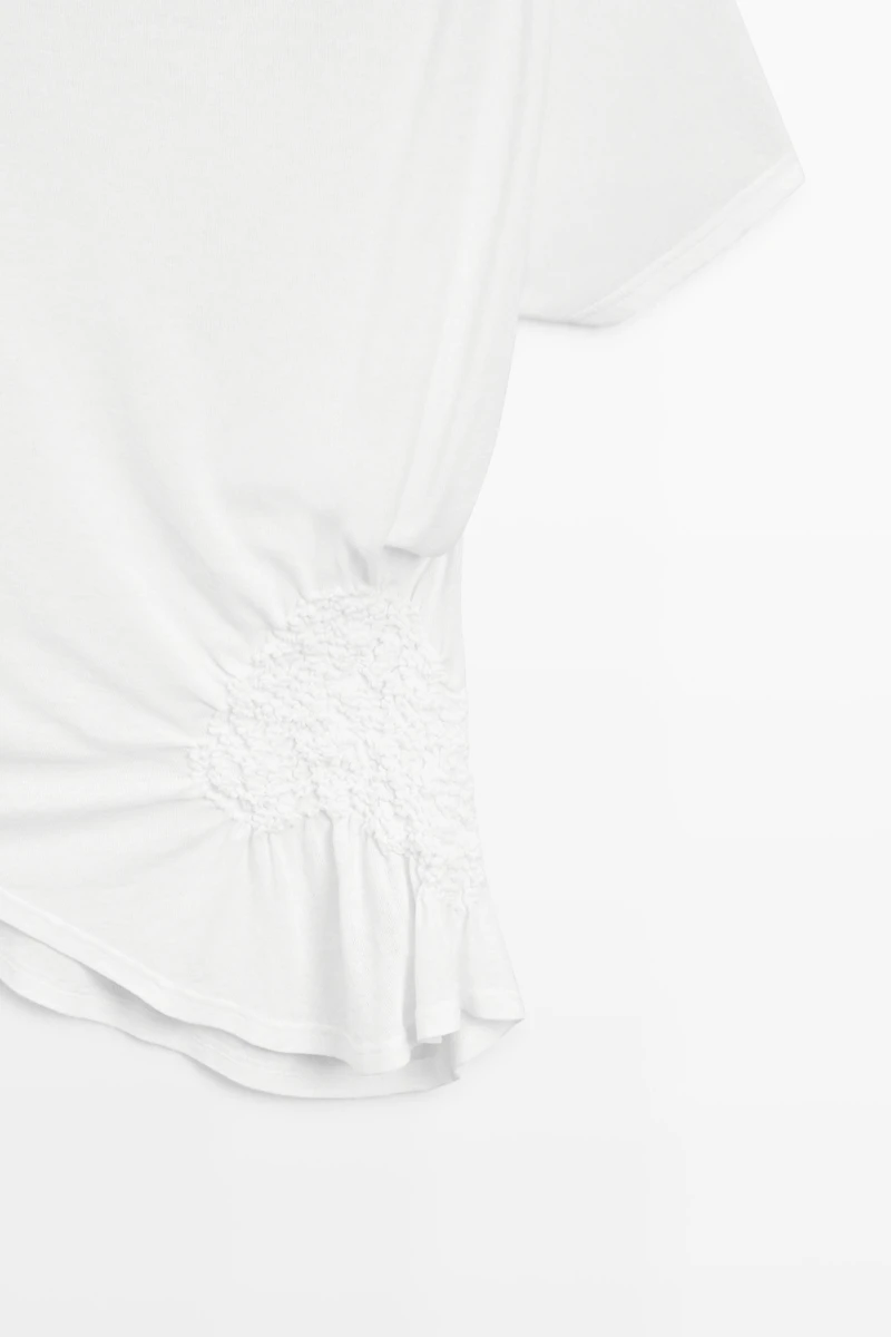 Asymmetric top with embroidered detail