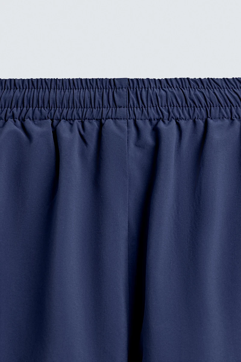 PANTALON TECHNIQUE À BANDES