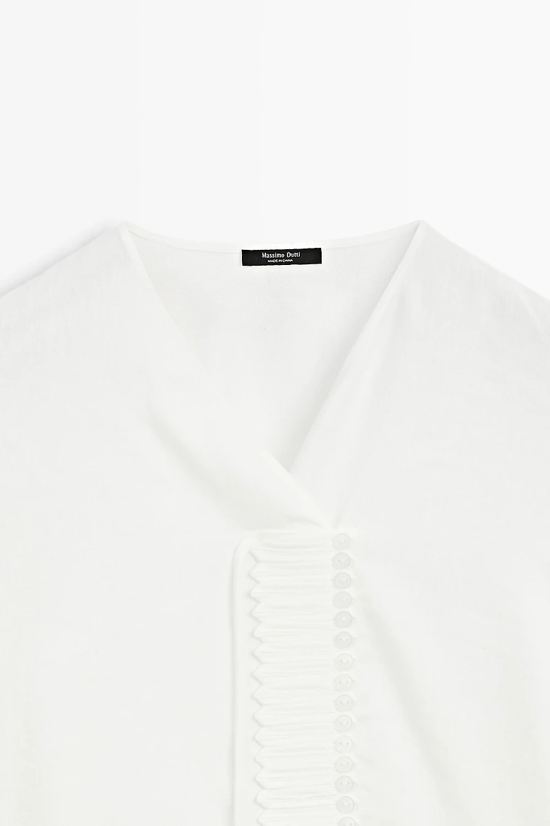Flowing linen blend blouse with button detail