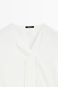 Flowing linen blend blouse with button detail