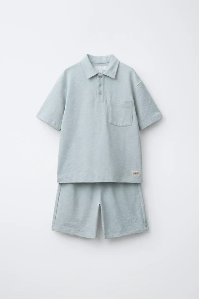 RUSTIC POLO AND BERMUDA SET WITH LABEL