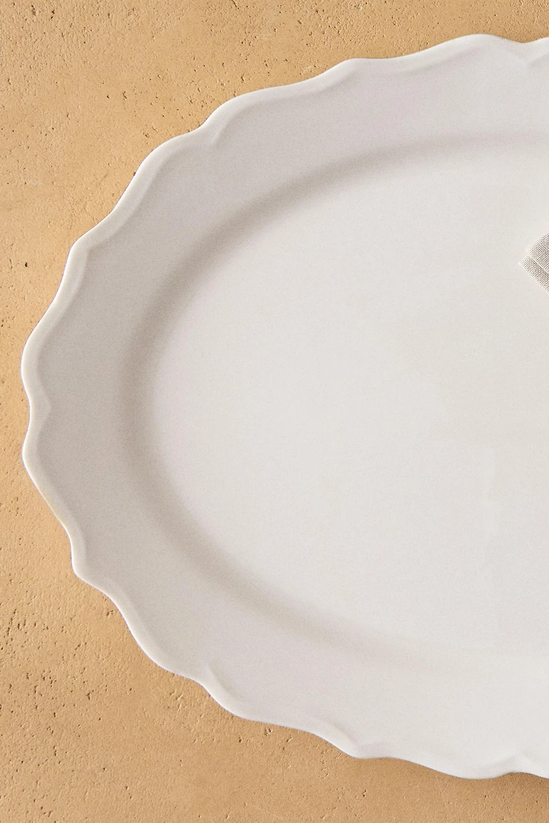 EARTHENWARE SERVING DISH WITH RAISED-DESIGN EDGE