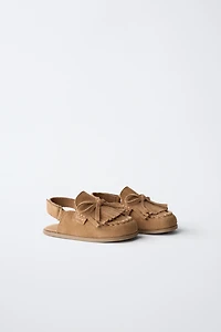 SABOTS EN CUIR PIEDS NUS