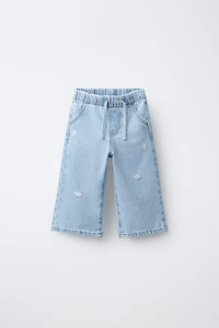 WIDE LEG RIPPED JEANS
