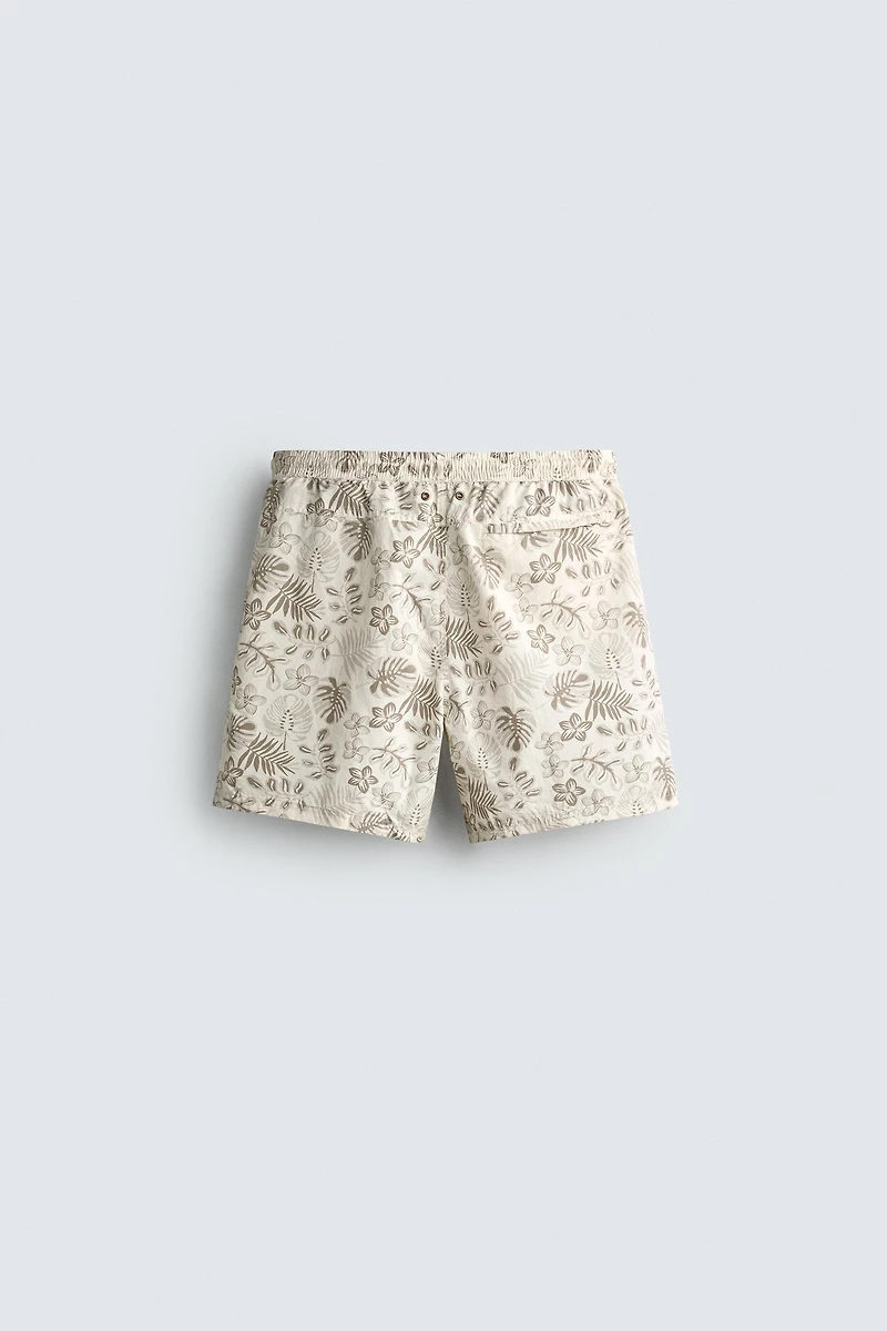 LONG FLORAL PRINT SWIM SHORTS