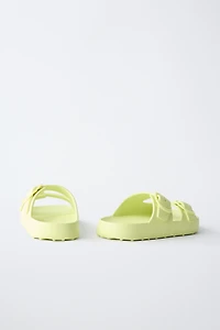 RUBBERIZED BUCKLED SANDALS